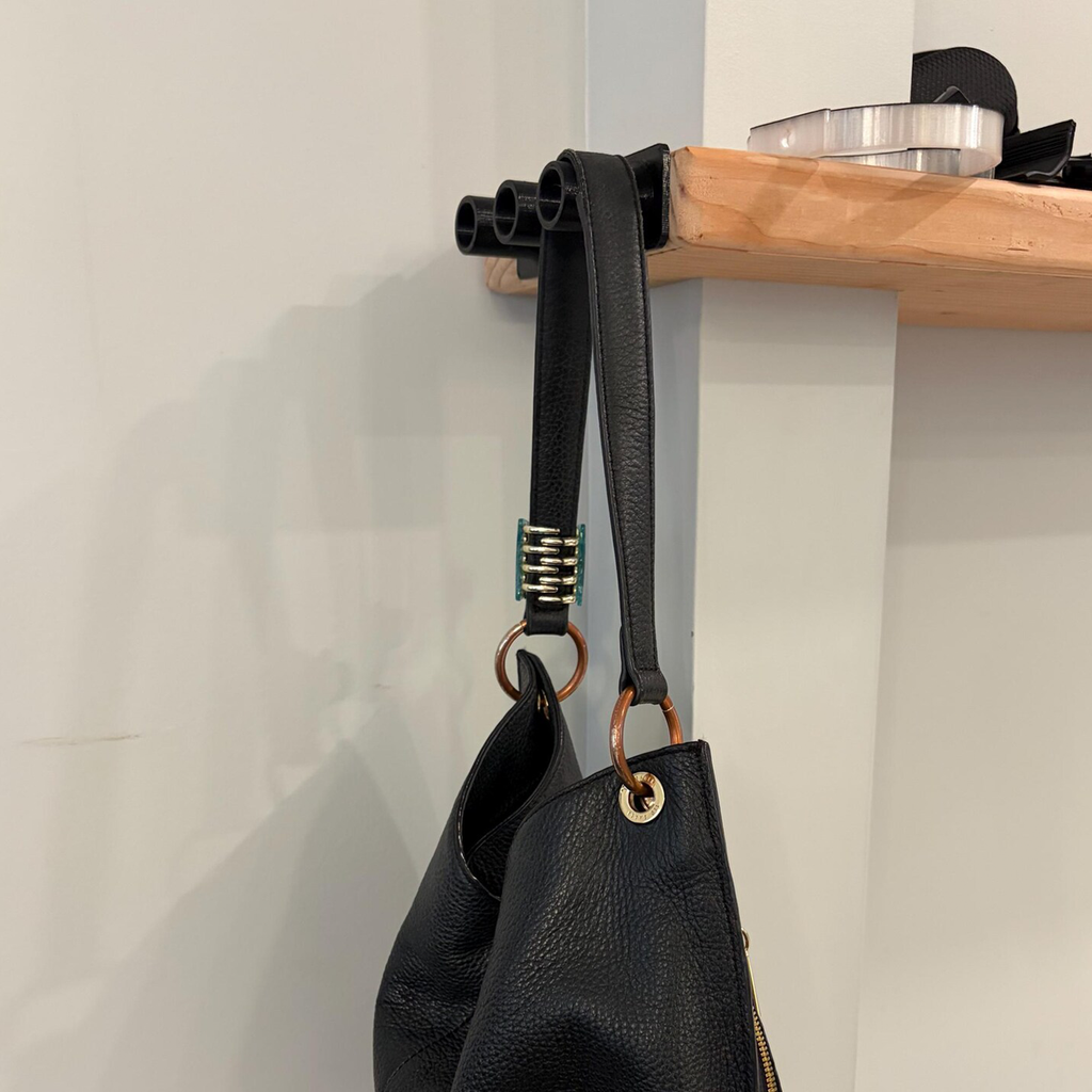 Cârlig de perete cu trei cilindri pentru genți și accesorii