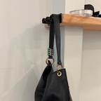 Cârlig de perete cu trei cilindri pentru genți și accesorii